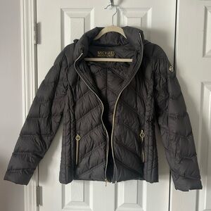 Michael Kors women’s lightweight puffer size small dark gray mid length